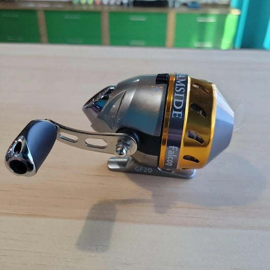 Streamside Golden Falcon Spincast Reel.